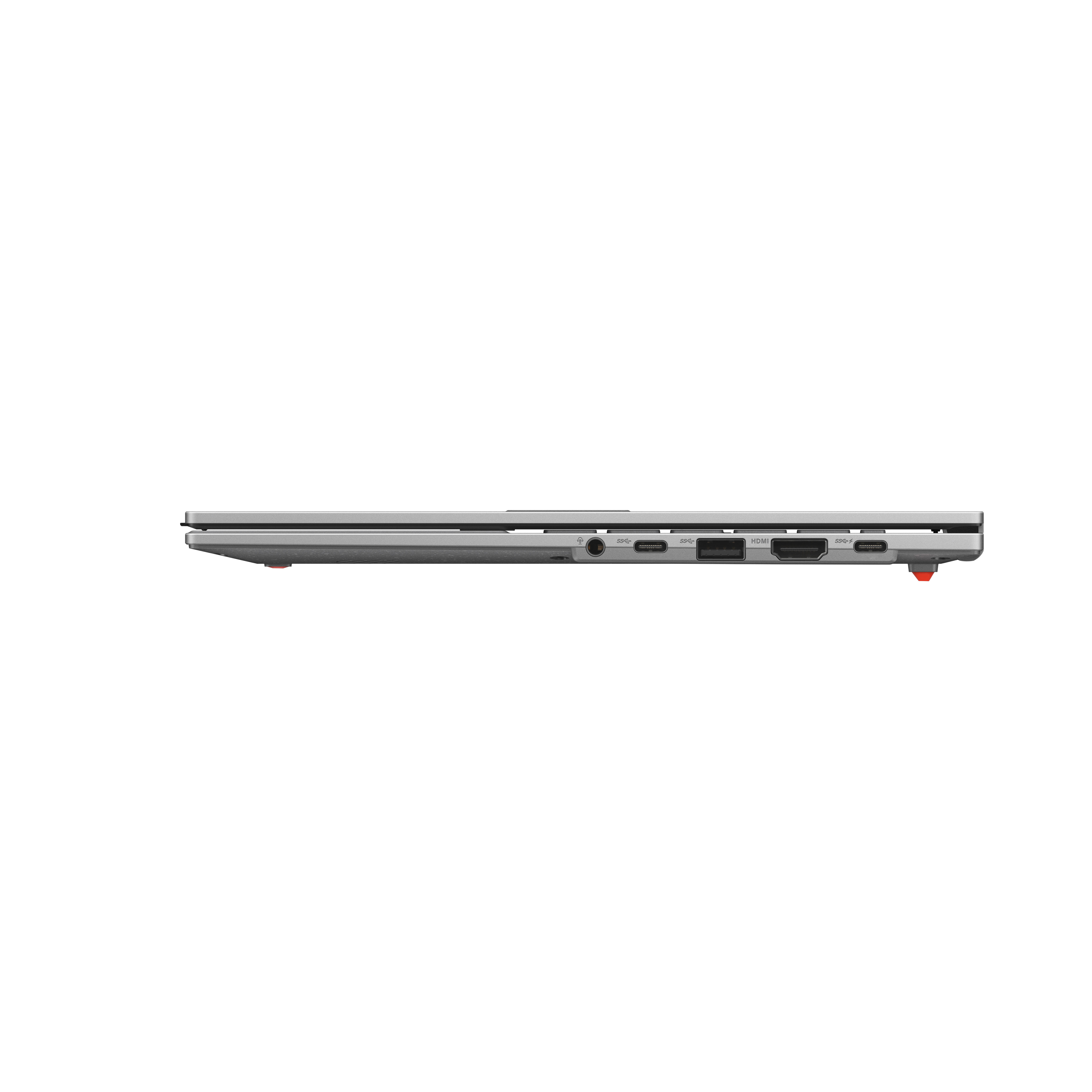Laptop side view. Shows ports and a red button. The laptop is silver-gray.
