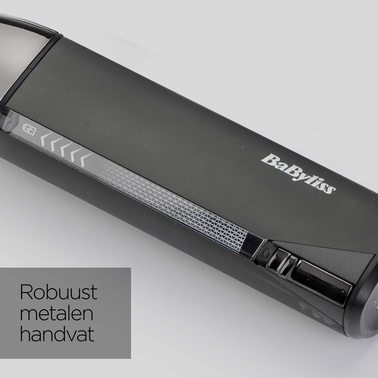 Close-up of a black BaByliss trimmer with a silver accent. Features a power button and battery indicator. The text 'Robuust metalen handvat' is visible.