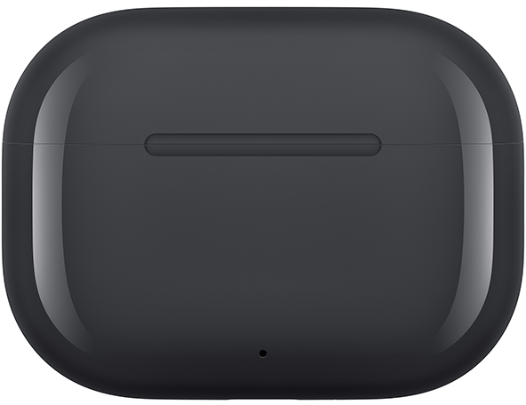 Egy zárt, sötétszürke AirPods Pro tok. Lekerekített téglalap alakú, tetején egy kis bemélyedéssel, alján pedig egy kis ponttal.