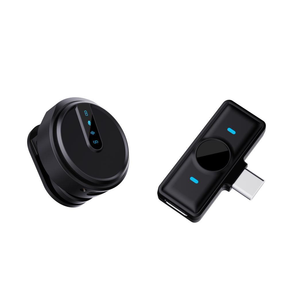 Két fekete technikai eszköz kék fényekkel. Az egyik kerek, a másik téglalap alakú, USB-C csatlakozóval.