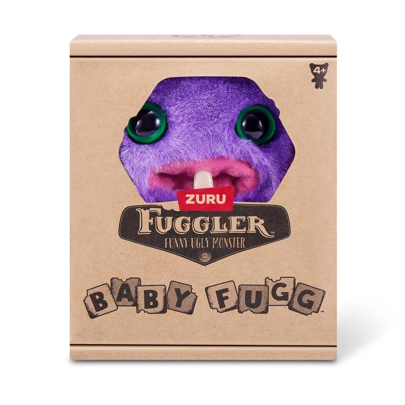 Eine braune Schachtel zeigt ein lila Fuggler-Spielzeug mit grünen Augen und den Worten "Funny Ugly Monster". Darunter steht "BABY FUGG".
