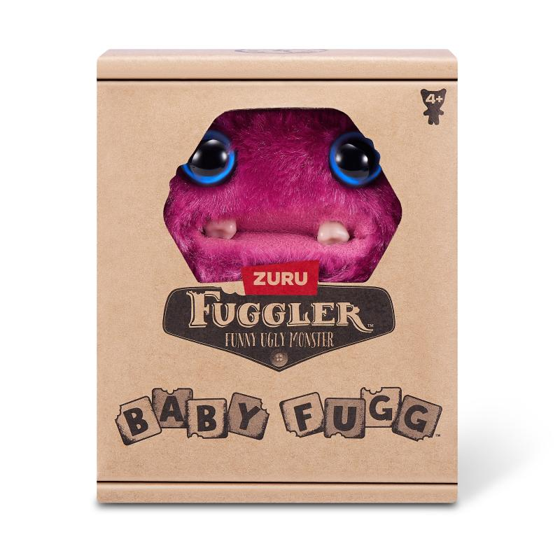 Ein Fuggler-Spielzeug in einer Box. Das Spielzeug ist ein pelziges, lila Monster mit großen Augen und Zähnen. Auf der Box steht "Baby Fuggler".