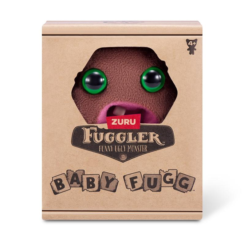 Eine Fuggler-Spielzeugbox mit einem braunen, pelzigen Monstergesicht, grünen Augen und dem Wort "Fuggler" auf der Box.