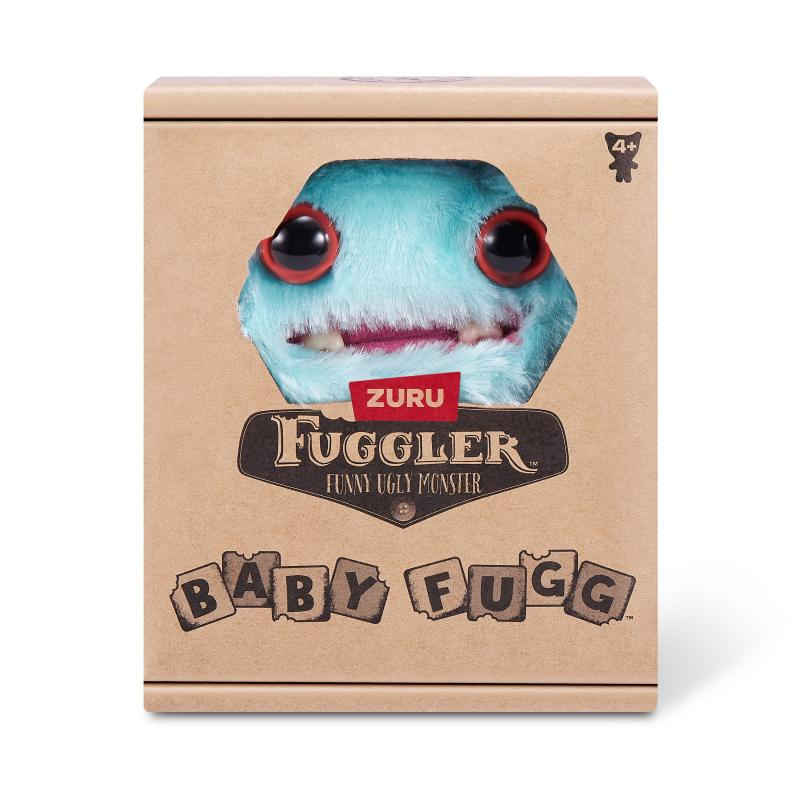 Eine Spielzeugkiste mit einem blauen Monster mit roten Augen. Auf der Schachtel steht 'Fuggler Funny Ugly Monster' und 'Baby Fugg'.
