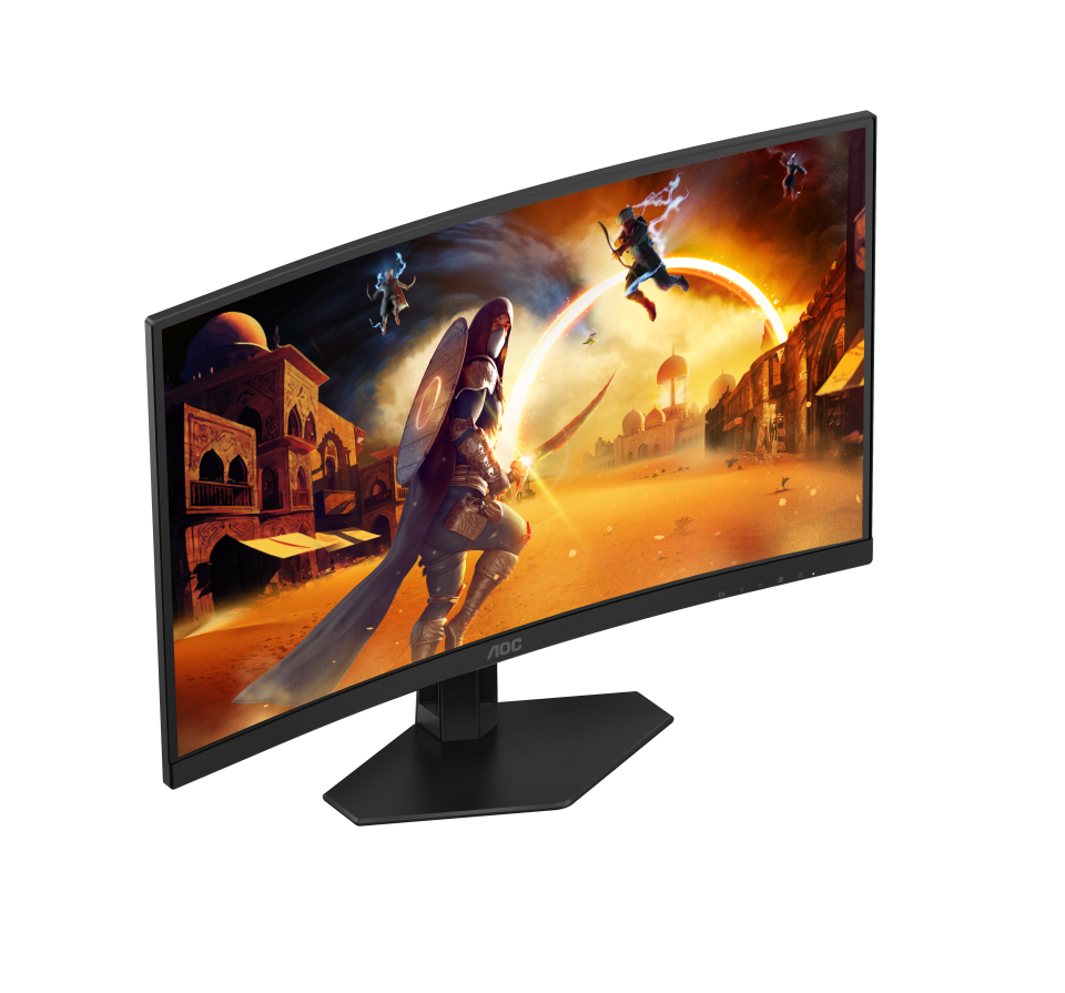AOC ívelt gaming monitor, egy fantasy csatajelenettel. Egy harcos pajzzsal és karddal küzd egy sivatagi városban.