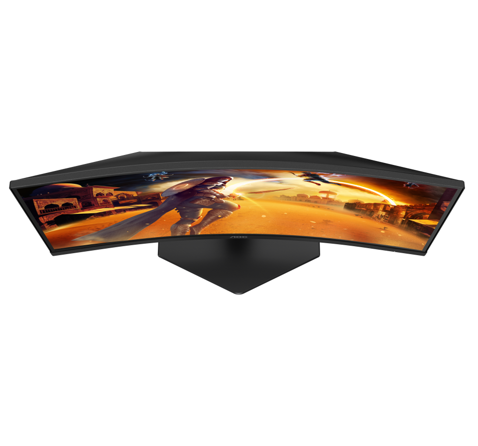 Egy ívelt gamer monitor egy fantasy csatajelenetet jelenít meg. Egy páncélos harcos a középpontban, egy vár a háttérben.