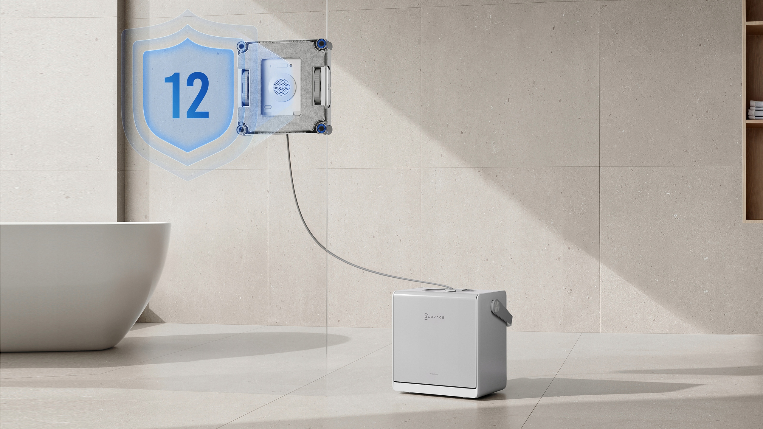 Robot do mycia okien jest na ścianie. Tarcza z numerem 12 jest również na ścianie. Białe pudełko stoi na podłodze.