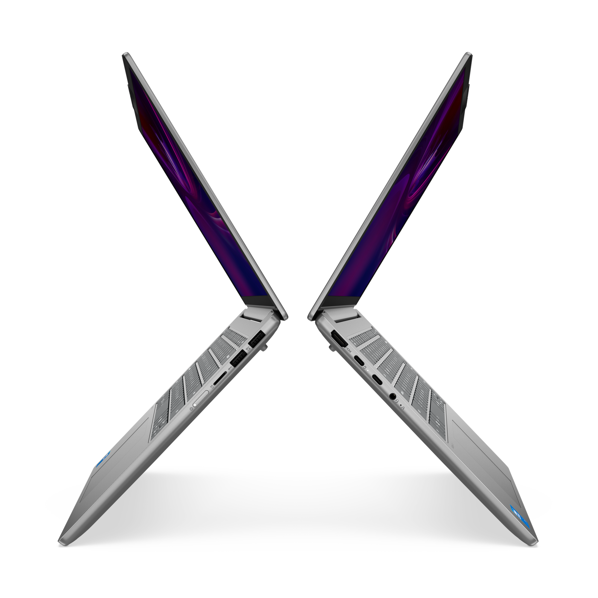 Zwei silberne Laptops stehen sich diagonal gegenüber, vor schwarzem Hintergrund. Bildschirme zeigen lila Farbverläufe.