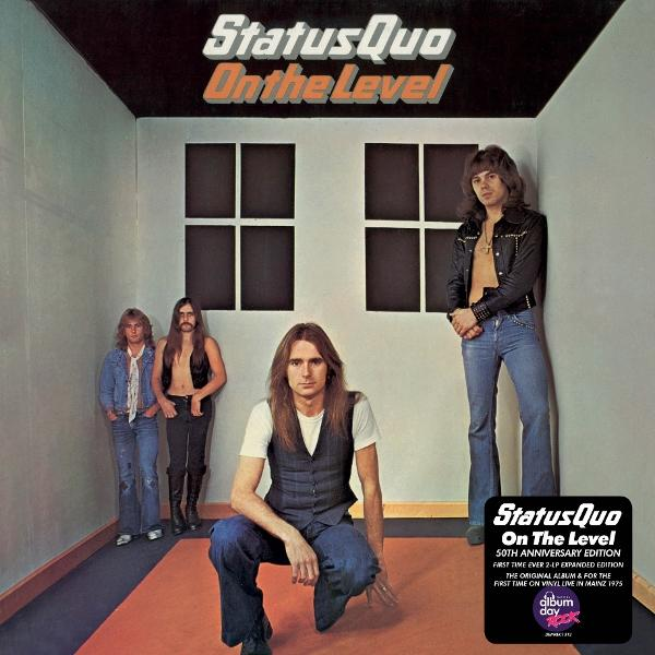 Albumcover von Status Quo. Vier Männer in einem Raum mit rotem Boden. Zwei Fenster an der Wand. Der Albumtitel steht über den Fenstern.