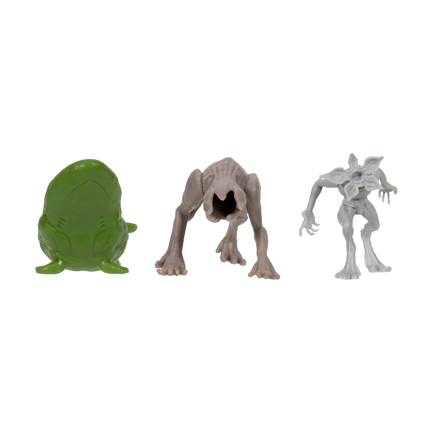 Tre figure di mostri: una creatura verde simile a una rana, un mostro color tan simile a un cane e un umanoide grigio con la testa a forma di fiore.