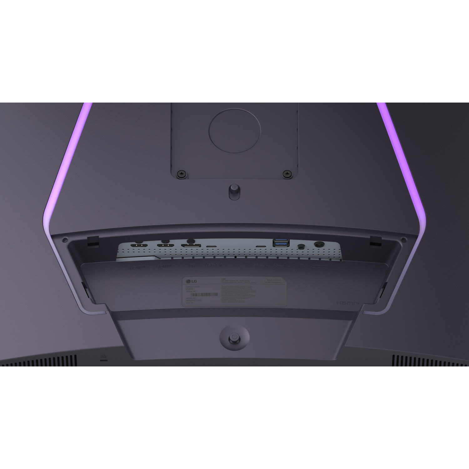 Back of an LG monitor. It has ports, labels, and a power button. The top has purple LED lights and is a dark gray color.