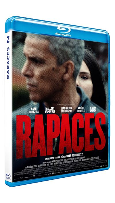 Couverture Blu-ray du film 'Rapaces'. Elle présente deux acteurs en arrière-plan et un grand texte rouge du titre du film en avant.