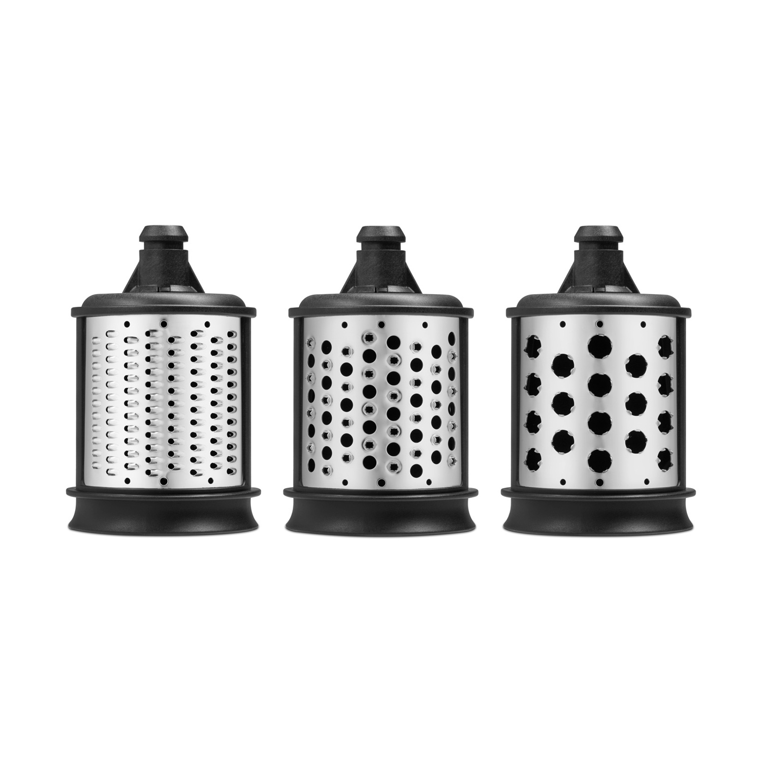 Tre accessori per grattugia da cucina in acciaio inossidabile con diversi motivi di fori su sfondo bianco.