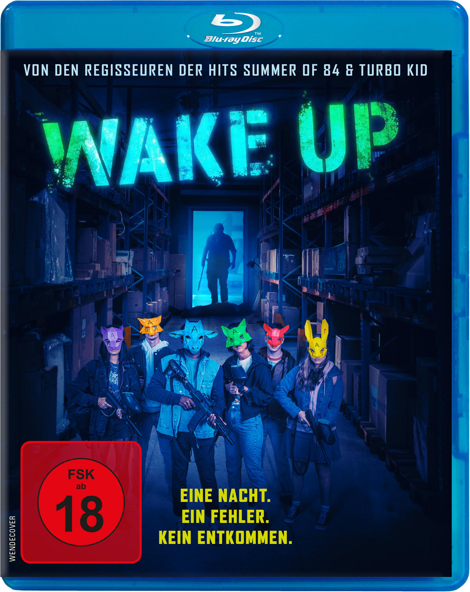 Blu-ray-Disc-Cover. Sechs maskierte Personen mit Waffen stehen vor einem Lagerhaus, darüber steht das Wort 'WAKE UP'.