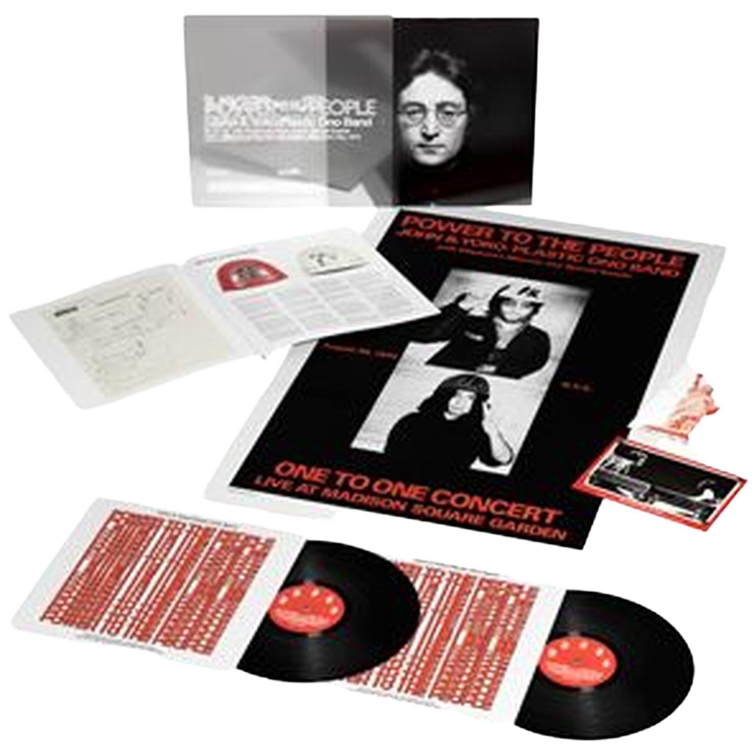 Album met vinylplaten, een poster met afbeeldingen van John en Yoko en een boekje met tekst. Zwart, wit en rood zijn de dominante kleuren.