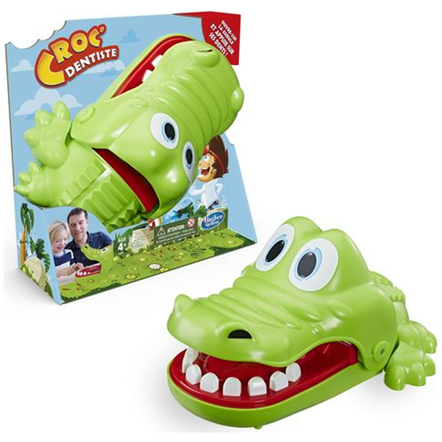 Green crocodile dentist toy with open mouth. Box shows the toy, people playing it. Crocodile has white teeth and red mouth.