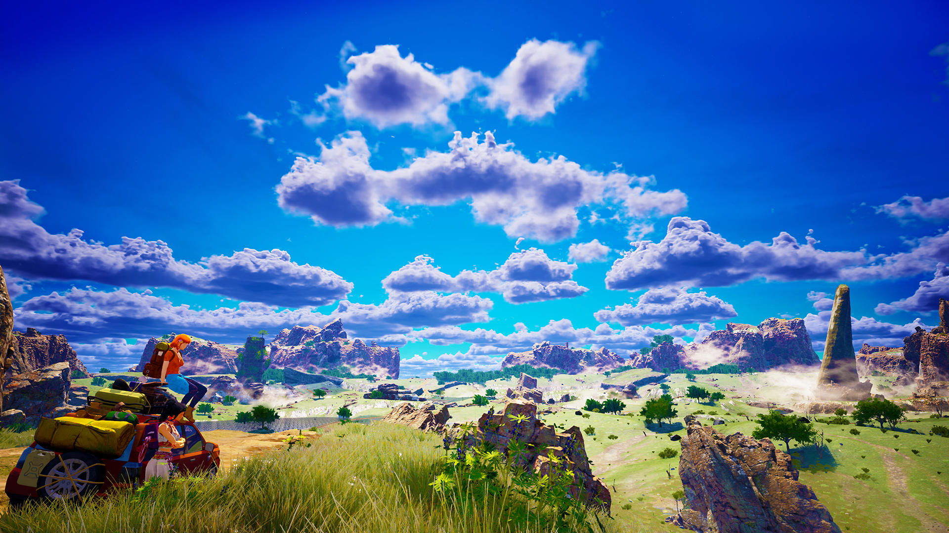 Eine Person sitzt auf einem mit Gepäck beladenen Auto und überblickt eine Landschaft mit Felsformationen, Bäumen und einem strahlend blauen Himmel mit Wolken.