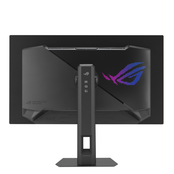 Egy sötétszürke ROG gaming monitor hátulja. A ROG logó rózsaszín és kék fénnyel világít. Az állvány szintén sötétszürke.