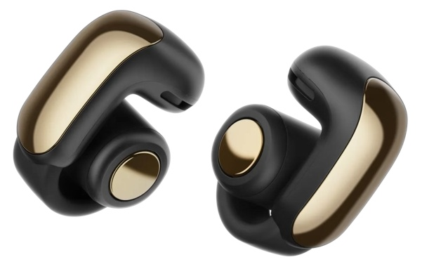 Dwa czarno-złote bezprzewodowe słuchawki. Każdy ma zaokrąglony kształt, złote akcenty i czarny korpus.