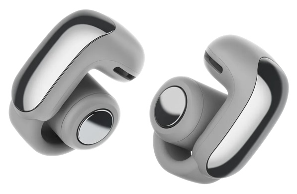 Dwa szare i srebrne słuchawki, futurystyczny design, odizolowane na czarnym tle, z białym obrysem.