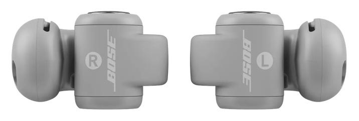 Dwie szare słuchawki Bose, oznaczone 'R' i 'L'. Każda ma zaokrągloną końcówkę douszną i prostokątny korpus z logo Bose.