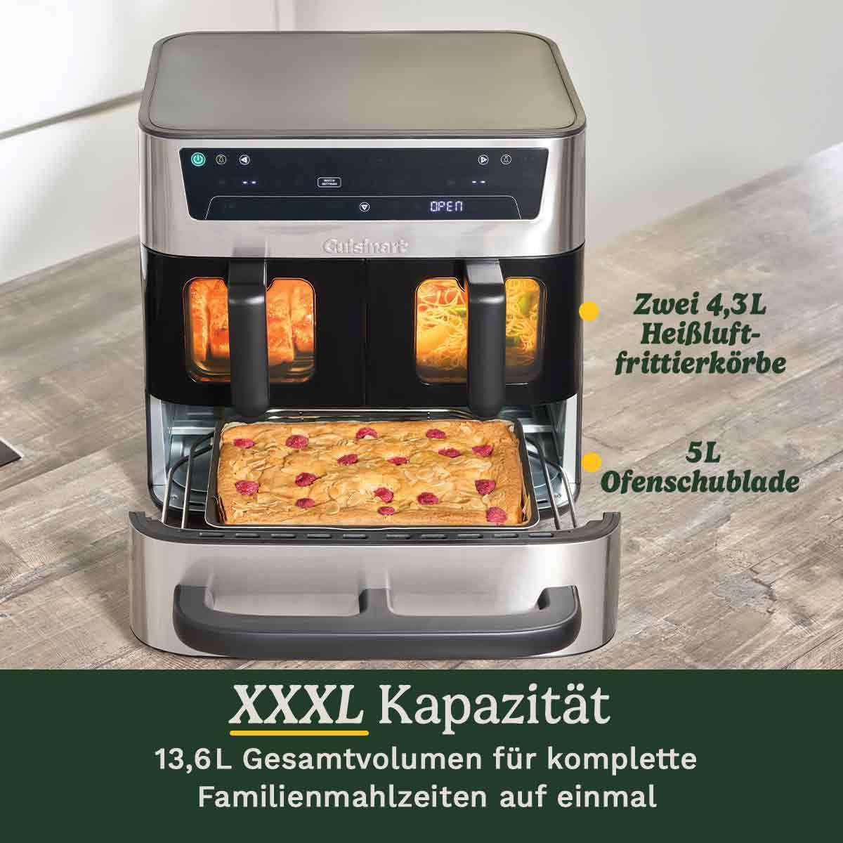 Ein silber-schwarzer Cuisinart-Heißluftfritteuse mit zwei Körben, eine Ofenschublade mit Kuchen und Text, der die Kapazität angibt.