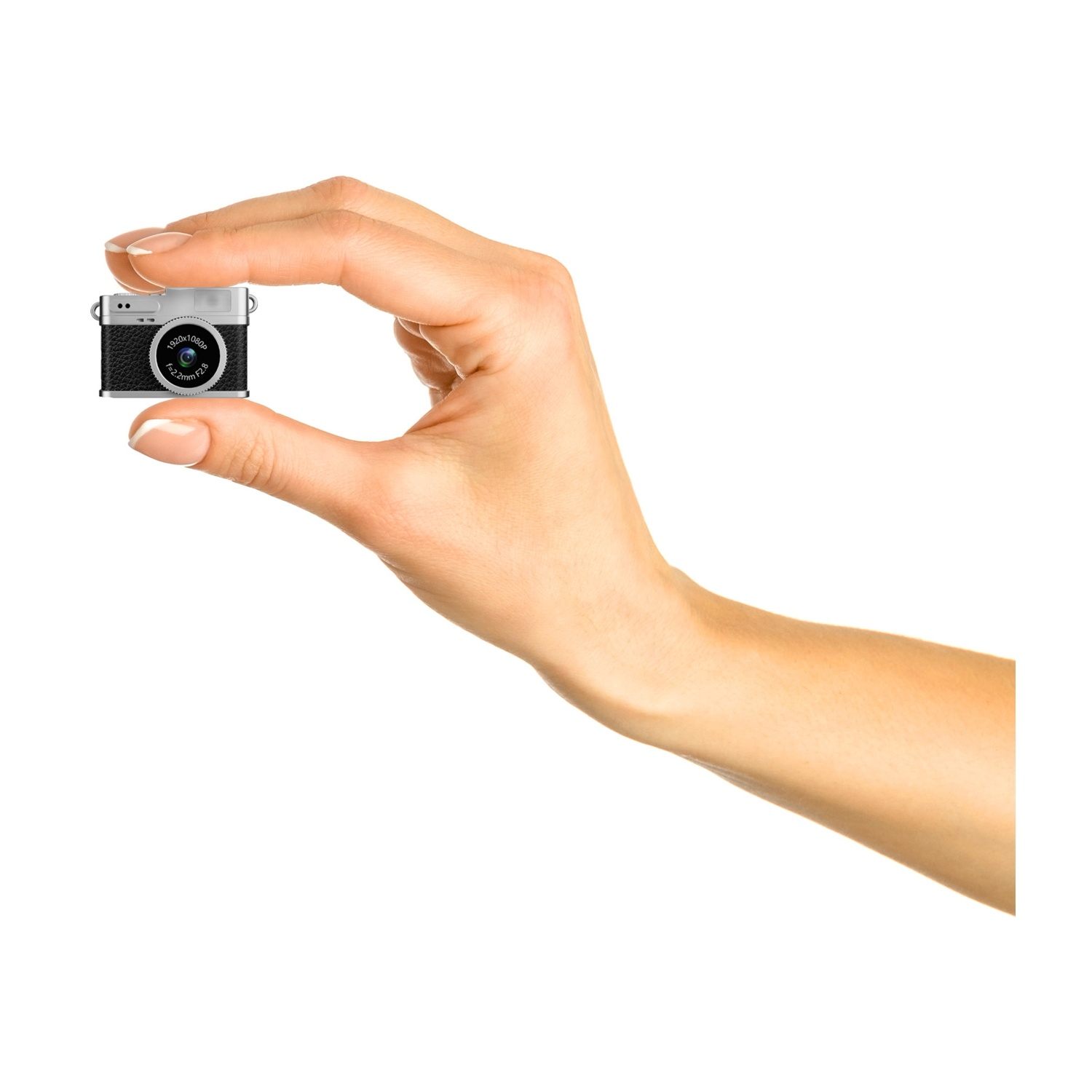 Una mano tiene una piccola fotocamera nera e argento su sfondo bianco. La fotocamera ha obiettivo, pulsanti e display.