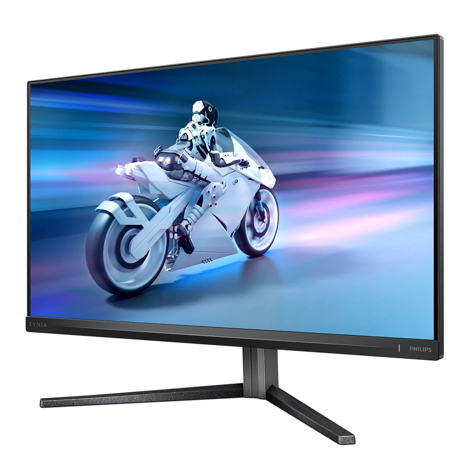 A számítógép monitora egy futurisztikus motorkerékpárt mutat, rajta a motorossal. A háttér kék és fehér színekkel mutat mozgás elmosódást.