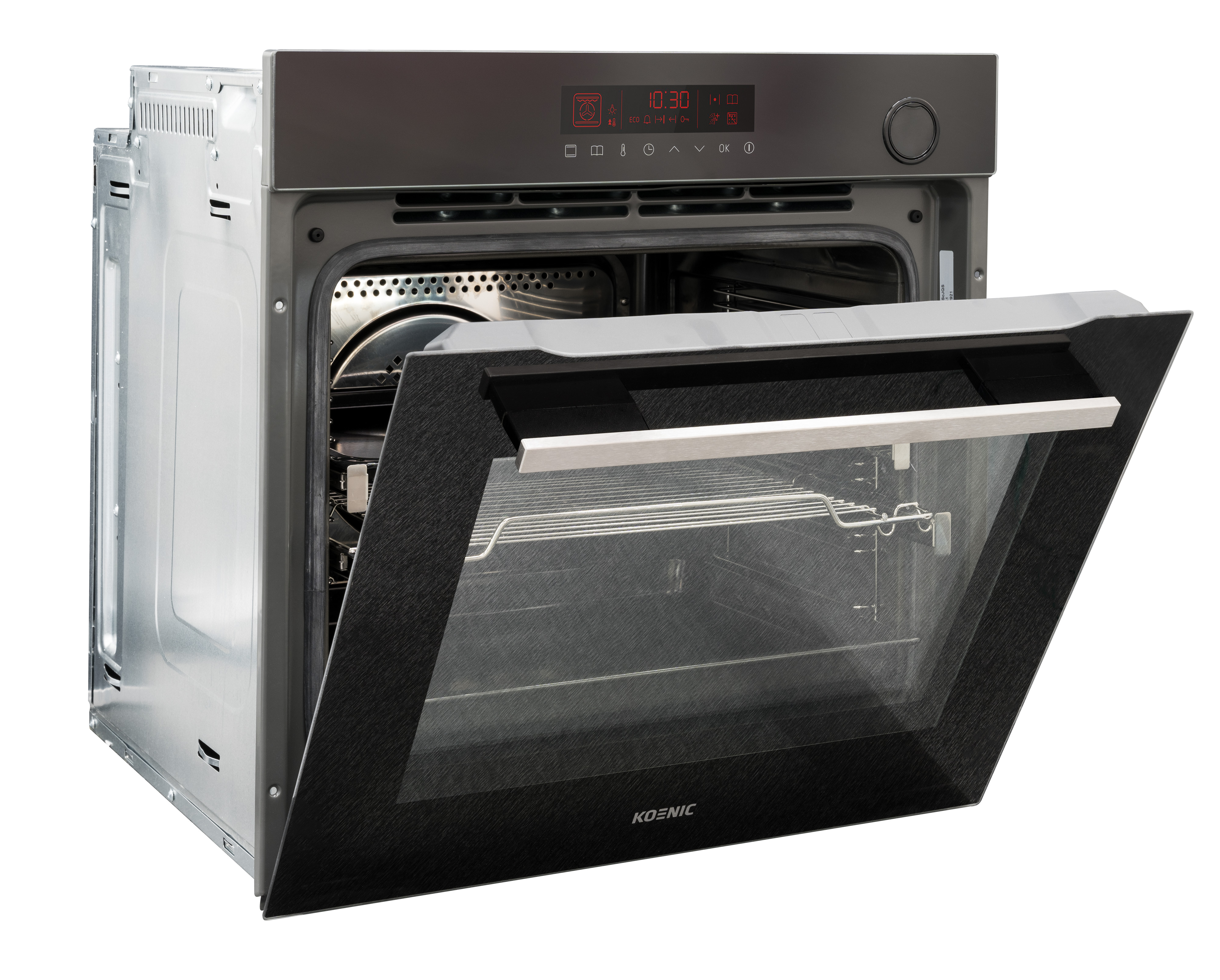 An open Koenic oven with digital display showing time. The door is black with a handle. Interior has metal racks.