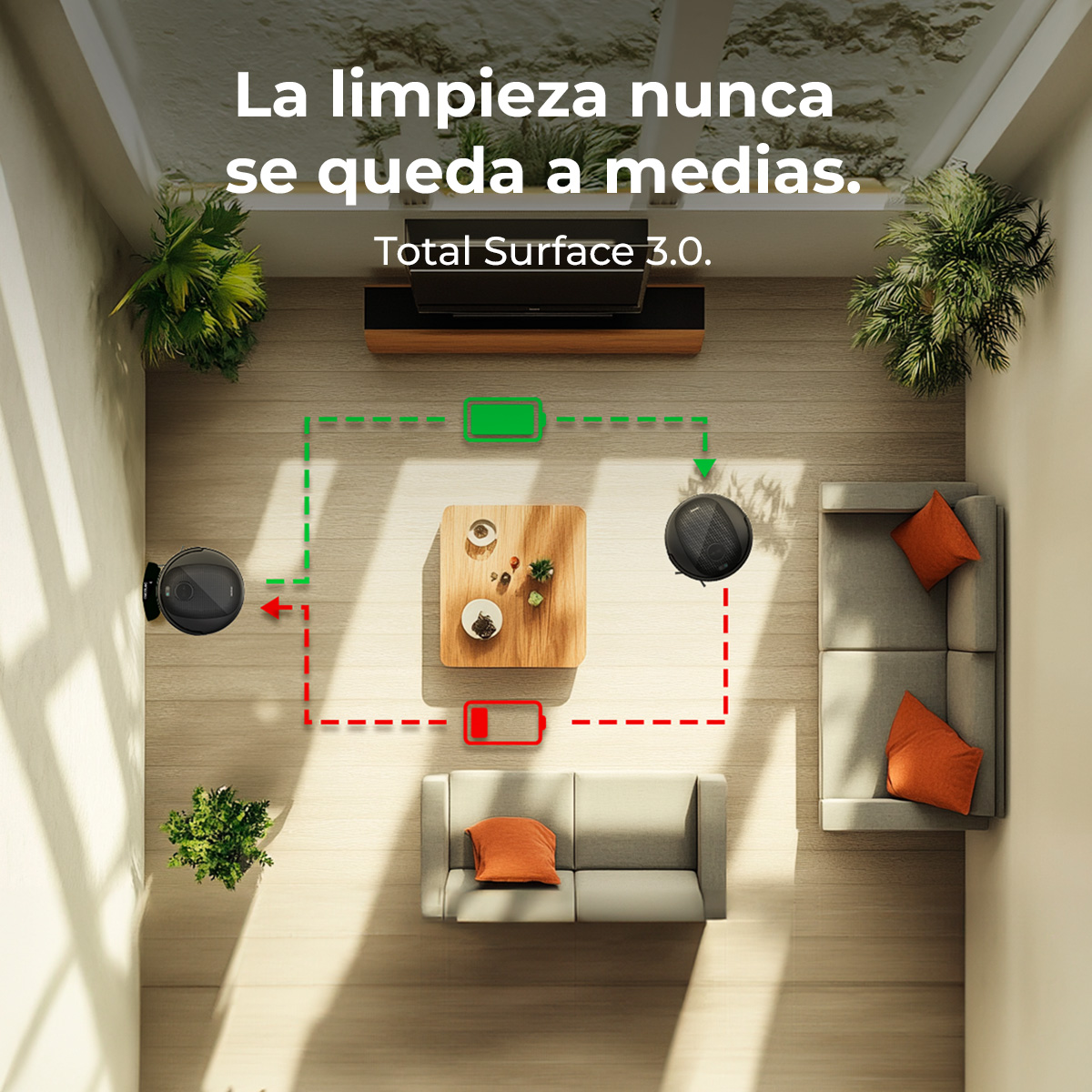 Vista superior de una sala de estar con dos robots aspiradores. Uno limpia, el otro se carga. Muebles: sofá, mesa y plantas.