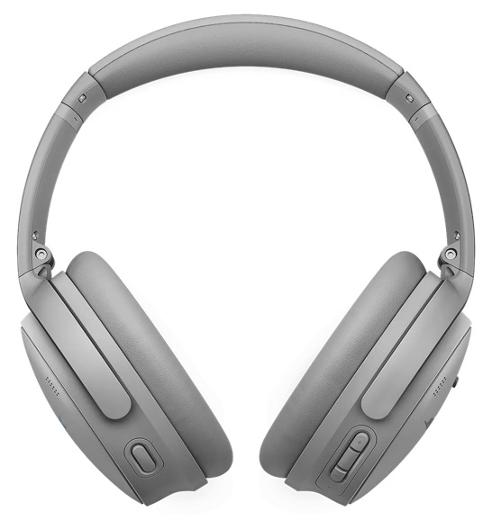 Zdjęcie z góry szarych słuchawek. Pałąk łączy się z nausznikami z przyciskami. Czysty, prosty design na białym tle.