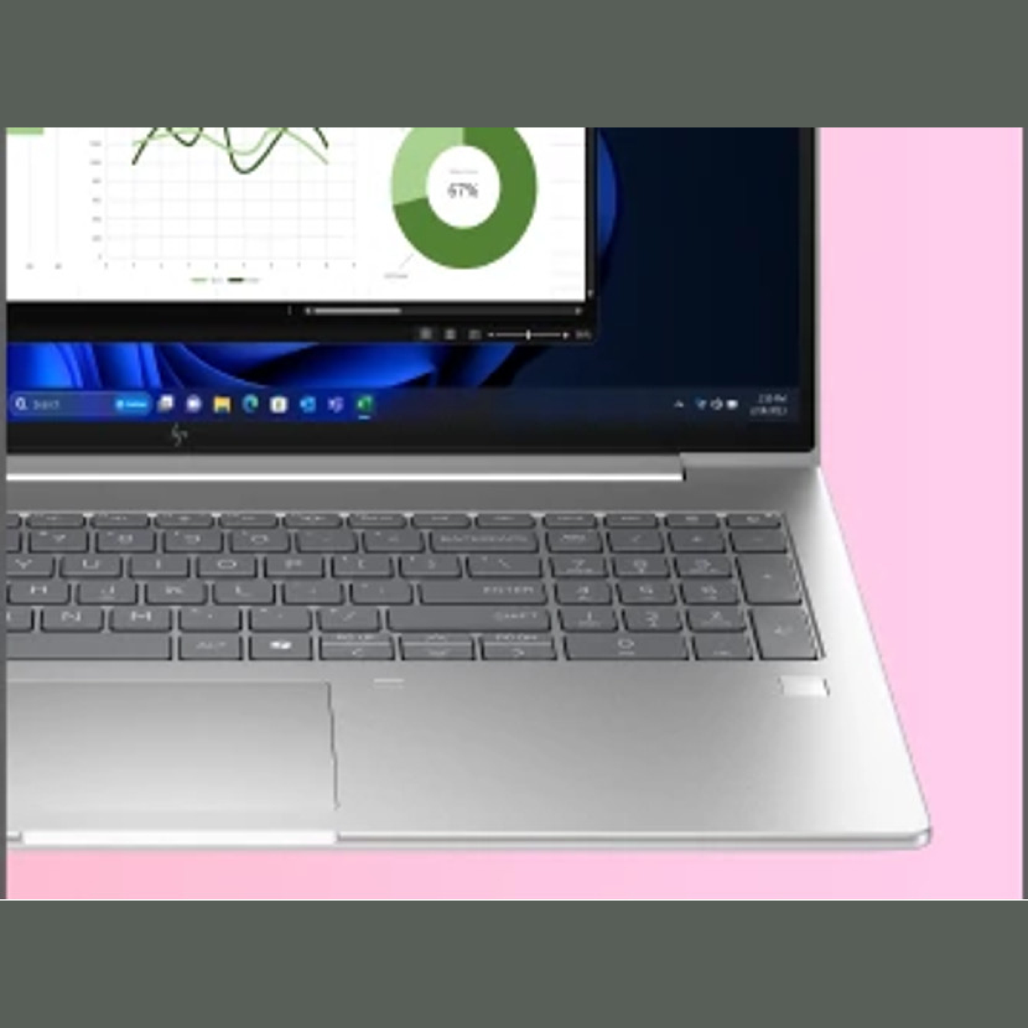 Laptop with open screen showing graphs and charts. Keyboard visible, silver color. Pink background.