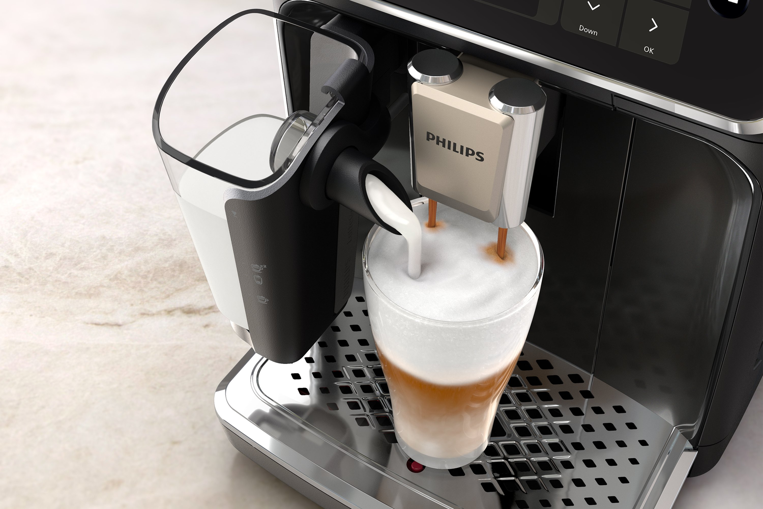 Una cafetera dispensa espuma de leche en un vaso de café. Son visibles el recipiente de leche y la cafetera.