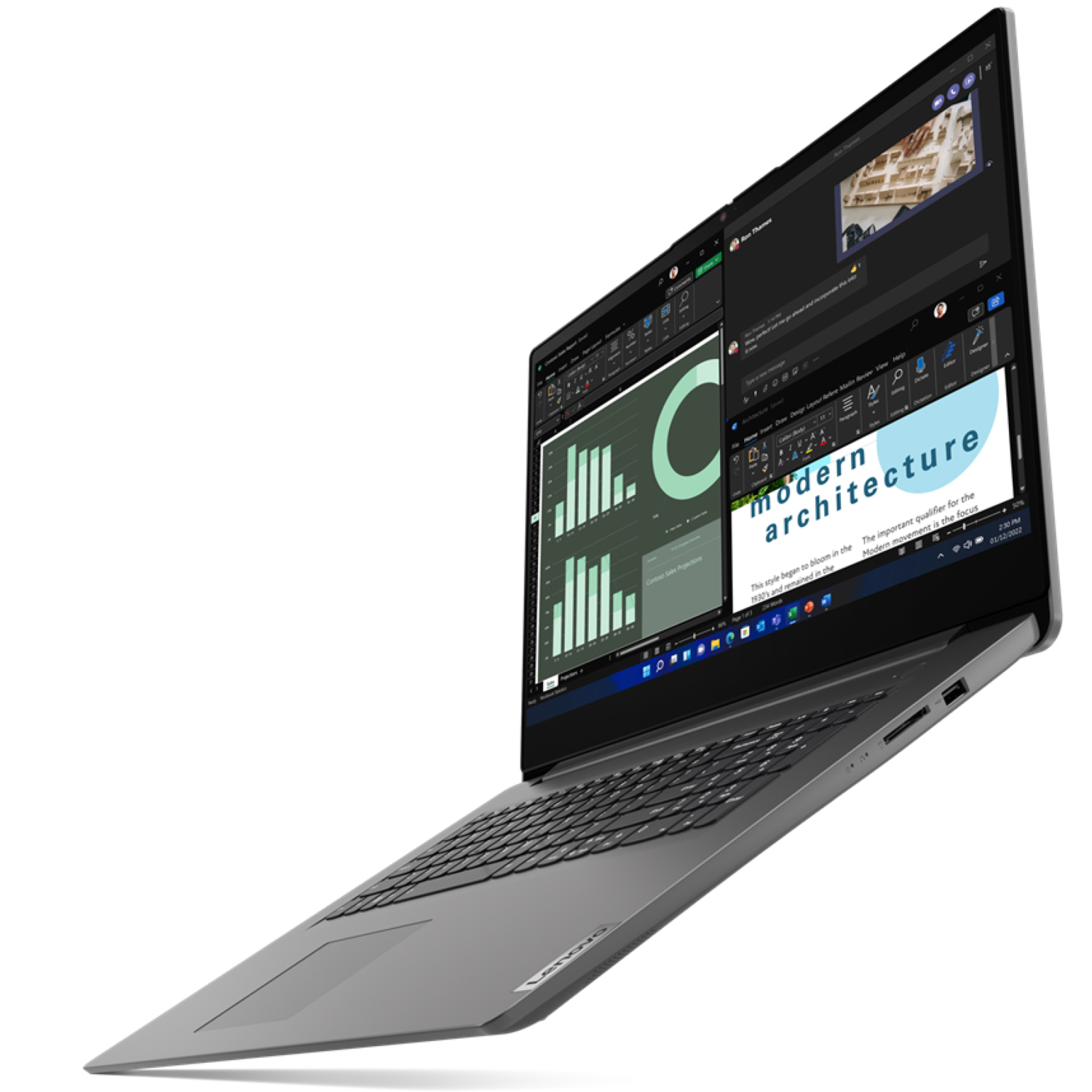 A gray Lenovo laptop is open, displaying various applications. The screen shows graphs, text, and a video call.