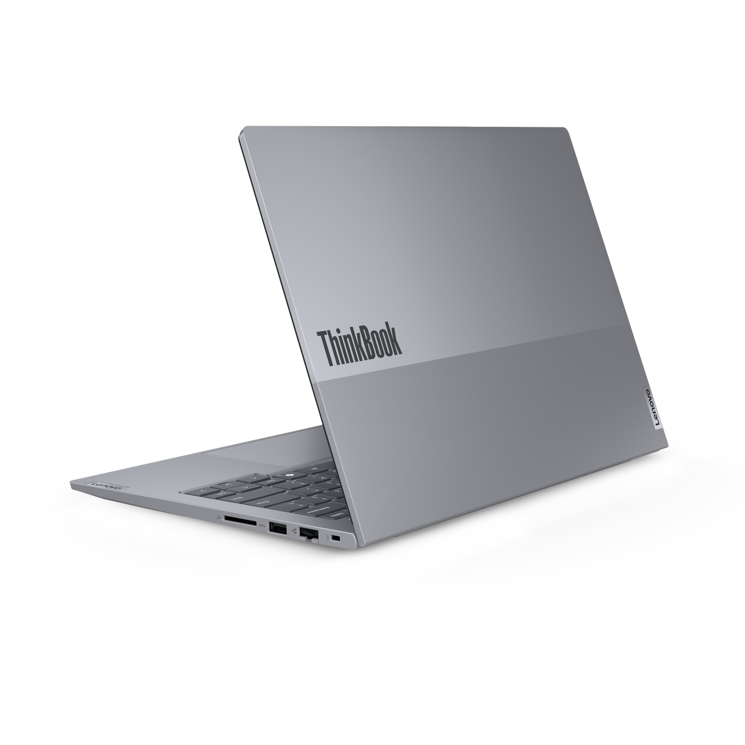 A silver ThinkBook laptop is slightly open, displaying the keyboard. The Lenovo logo is on the side, and ThinkBook on the lid.