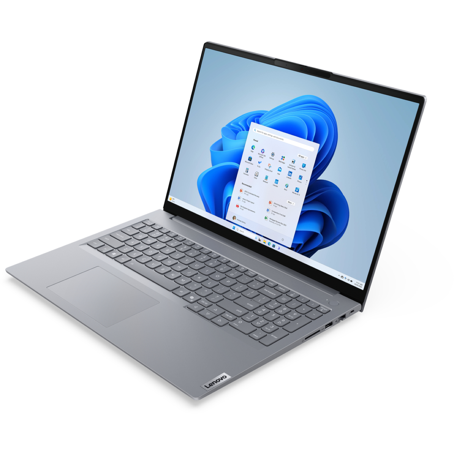 A silver Lenovo laptop is open, displaying the Windows 11 home screen with a blue and white abstract background.
