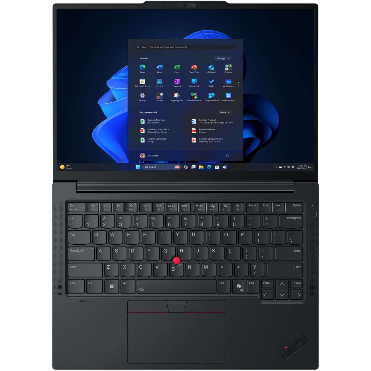 Black ThinkPad laptop open, showing Windows 11 interface. Keyboard visible with trackpad. Screen displays app icons.