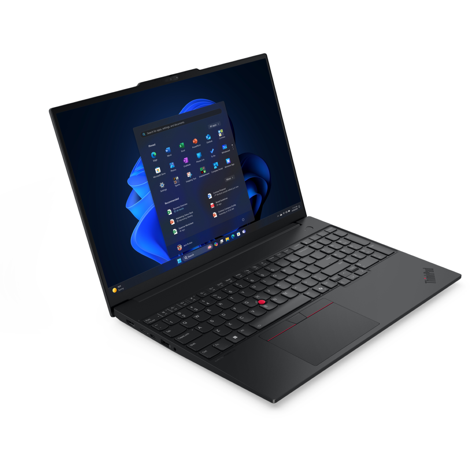 A black ThinkPad laptop is open, displaying the Windows 11 start menu on its screen. The keyboard and touchpad are visible.