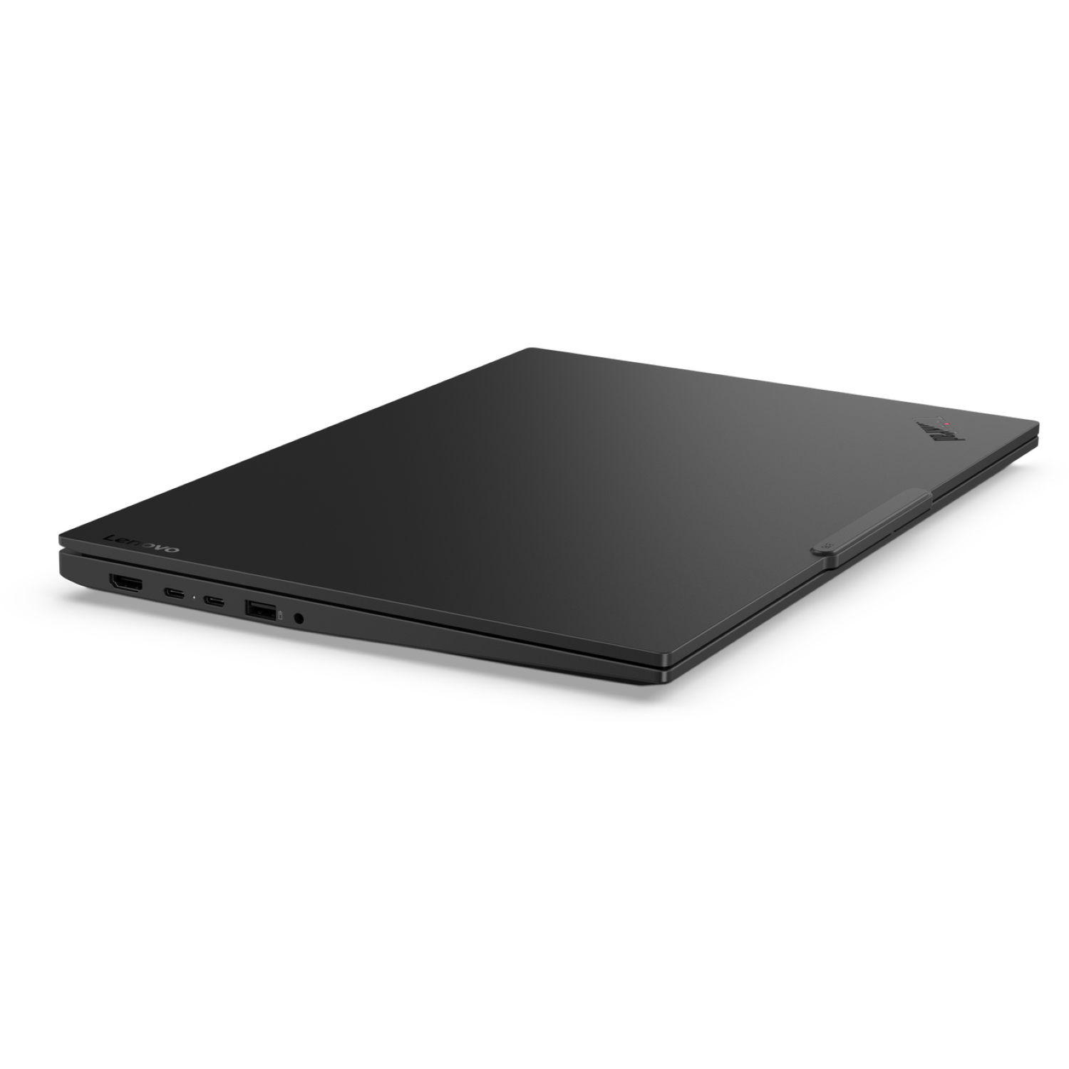 A closed, black Lenovo laptop is angled on a white surface. The laptop's side shows ports. The Lenovo logo is visible.
