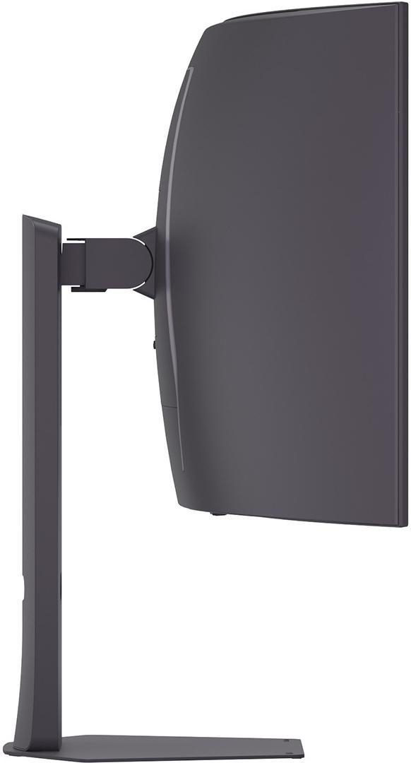 Seitenansicht eines dunkelgrauen Computermonitors. Der Monitor ist gebogen und auf einem Ständer montiert.