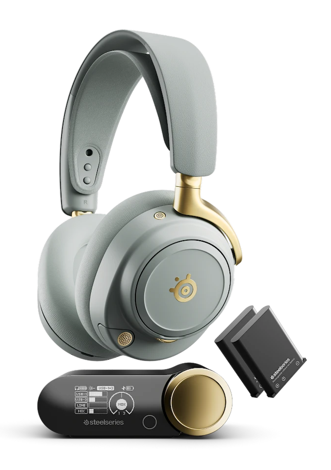 Obraz przedstawia szare słuchawki SteelSeries ze złotymi akcentami, jednostkę sterującą i dwie baterie na czarnym tle.