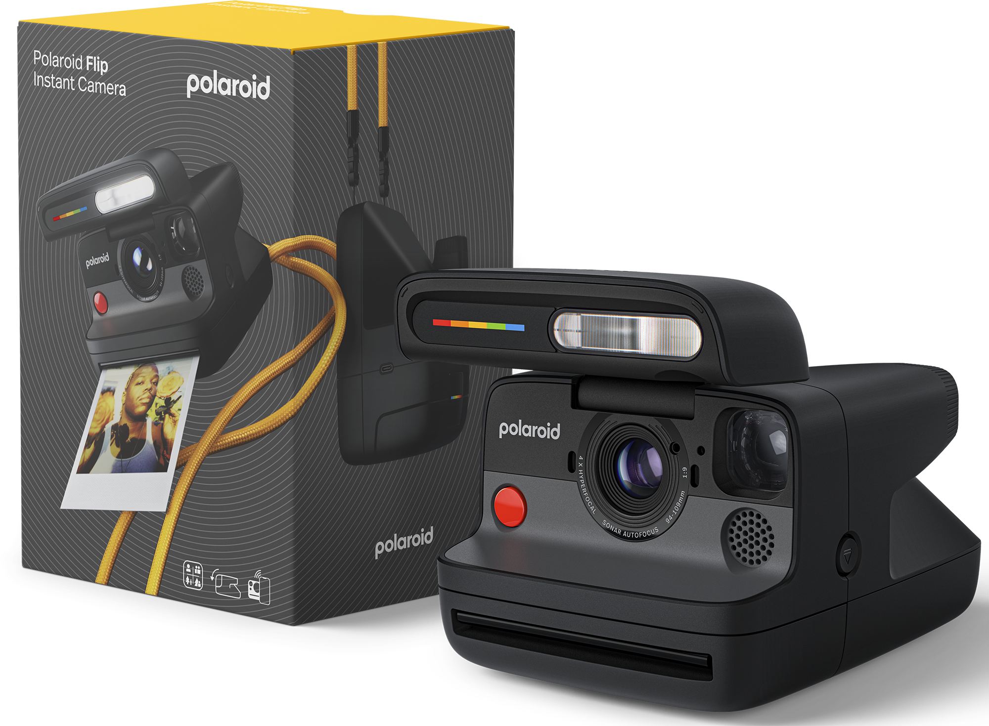 Egy fekete Polaroid instant kamera dobozzal. A doboz és a kamera fekete, sárga és piros díszítéssel.
