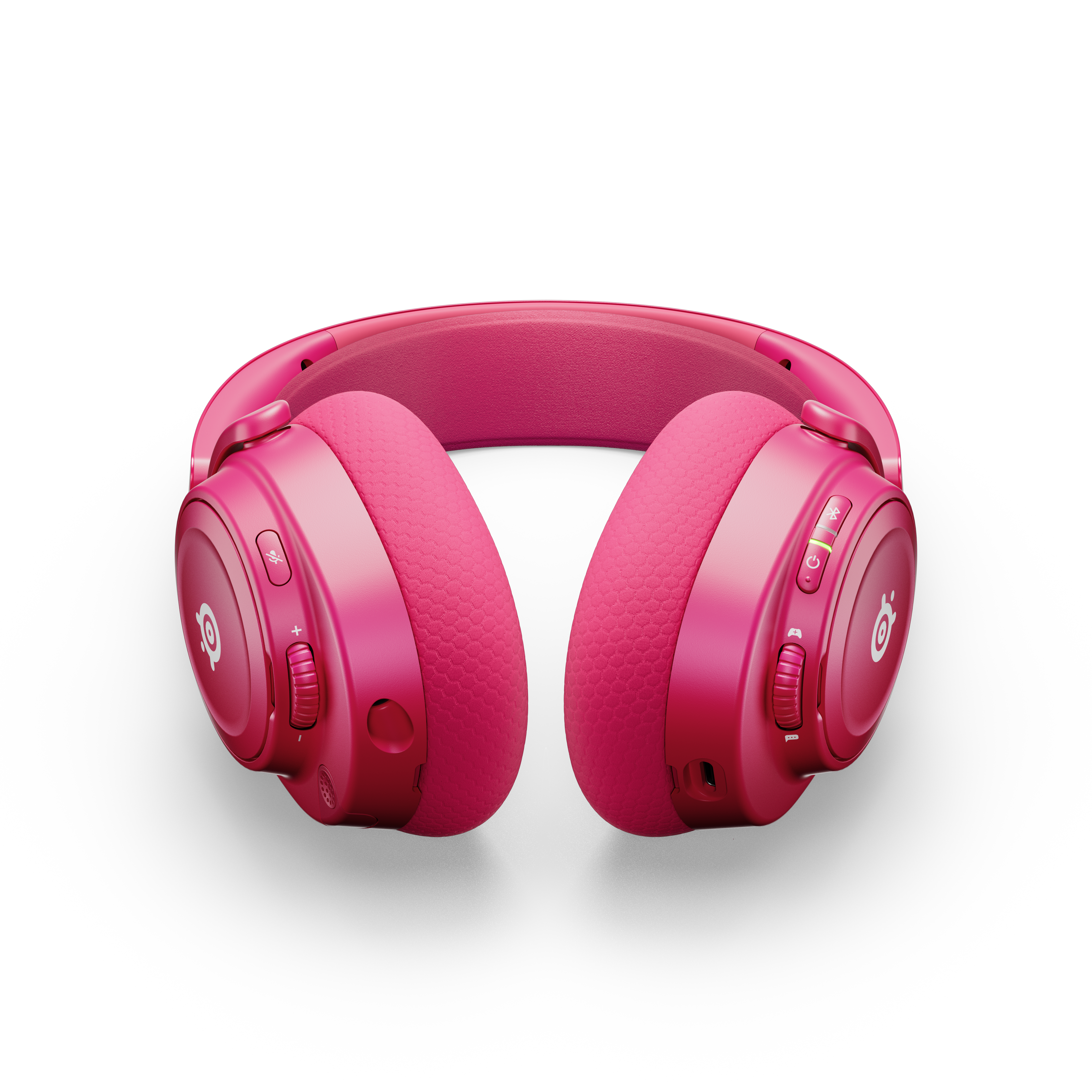 Różowe słuchawki na białej powierzchni. Słuchawki mają dwie słuchawki i pałąk. Widoczne logo SteelSeries.