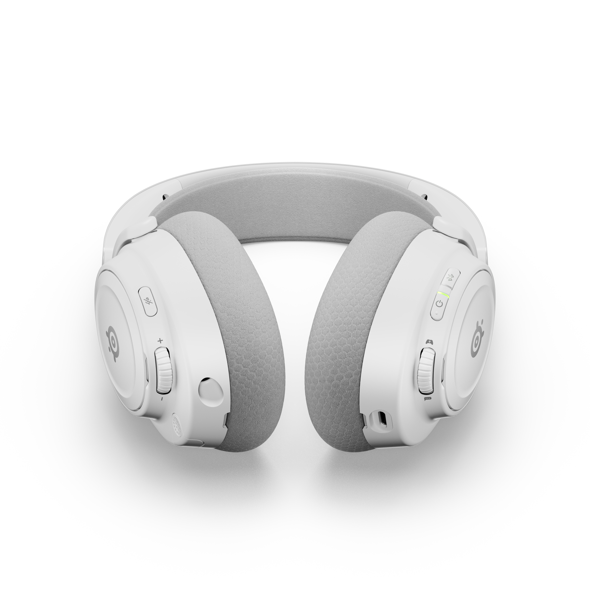 Białe słuchawki na czarnym tle. Szare nauszniki i pałąk. Elementy sterujące na nausznikach.