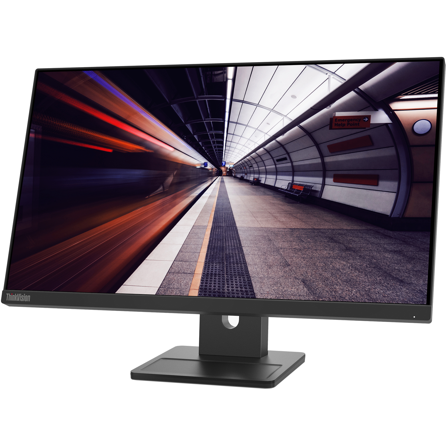 Monitor displays a subway station. Train lights streak. Black monitor on a black stand.