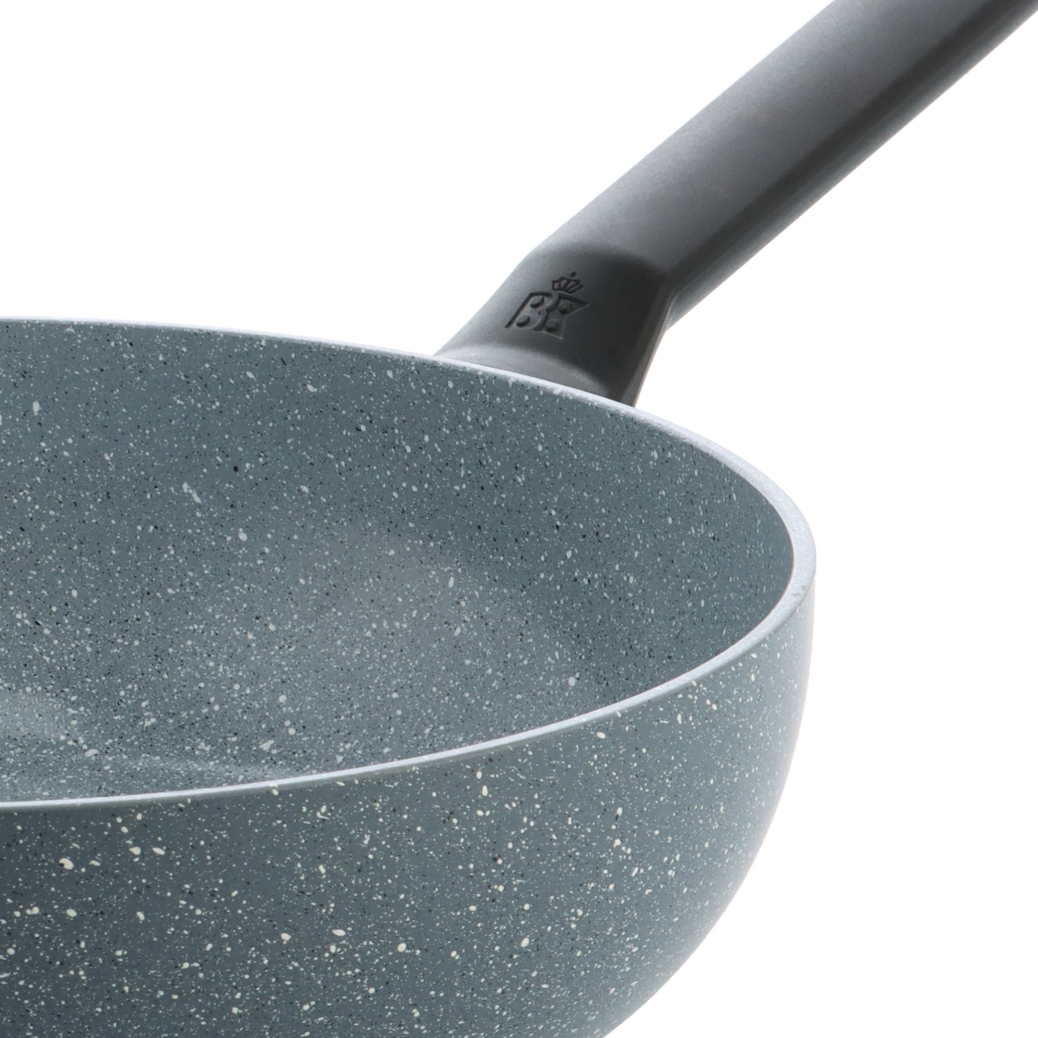 Close-up of a gray speckled frying pan with a dark gray handle, white background. The handle has the brand's logo.