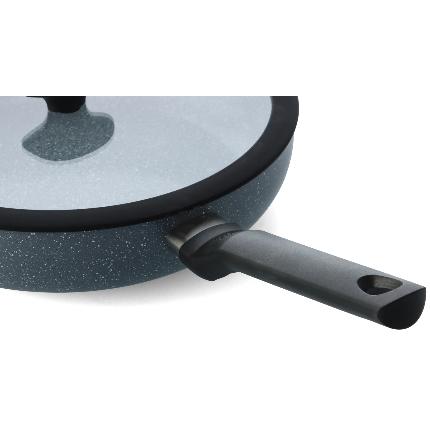 Close-up of a dark gray speckled frying pan with a black handle and a glass lid. The background is plain white.
