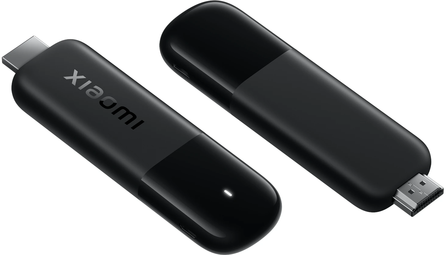Két fekete Xiaomi streaming eszköz fehér háttérrel. Az egyik a Xiaomi logóját mutatja.
