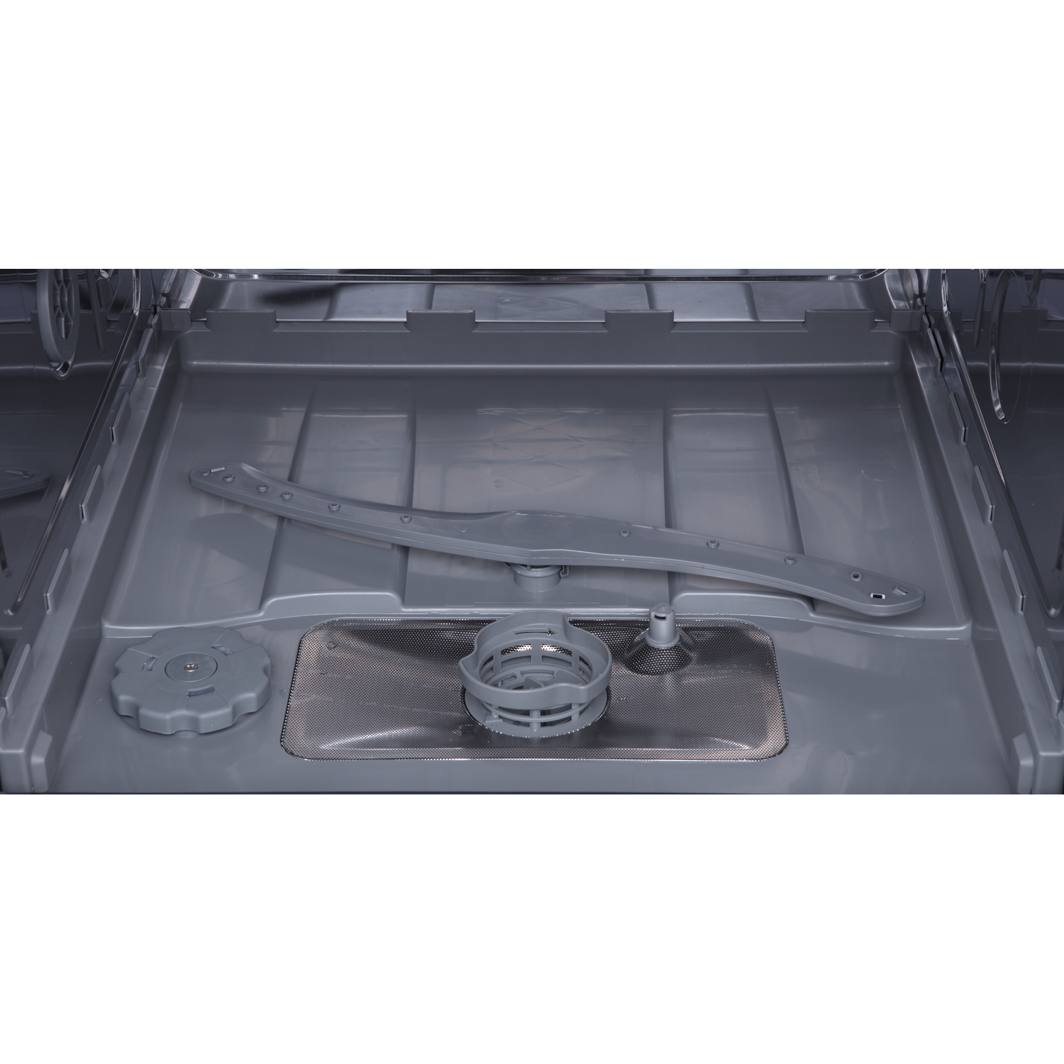 Inside a gray dishwasher. A long sprayer arm and a round filter are visible. Other components are also present.