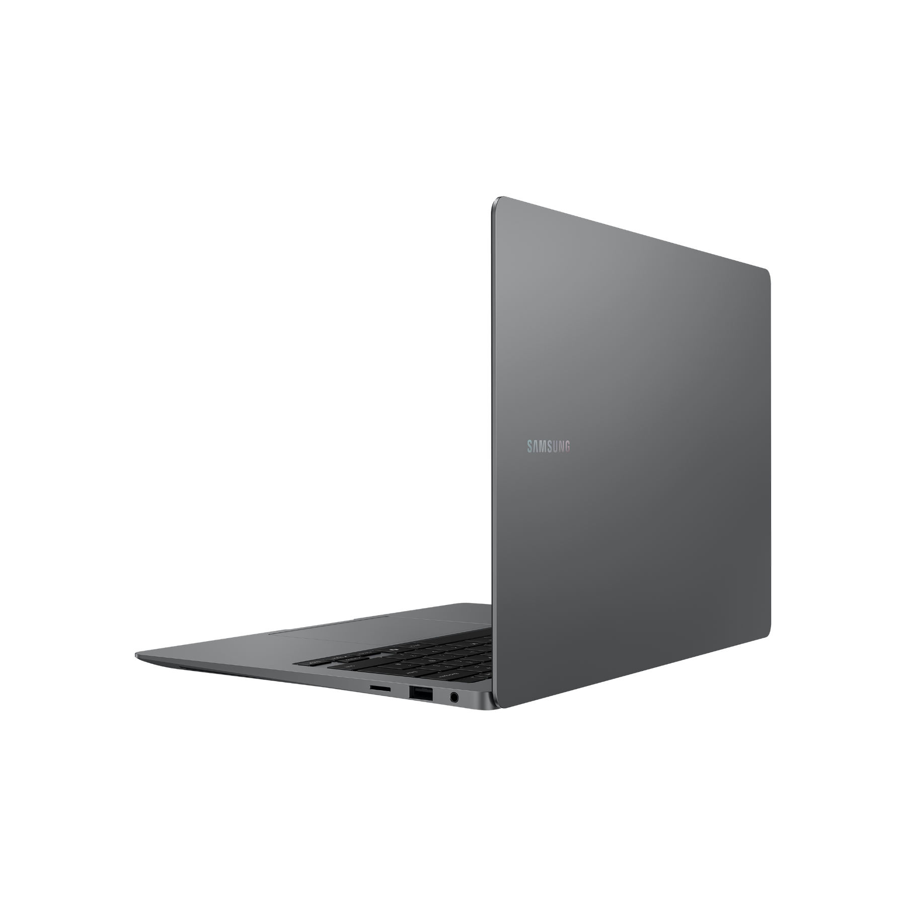 Un portátil Samsung gris está ligeramente abierto sobre un fondo negro. La marca es visible en la tapa.